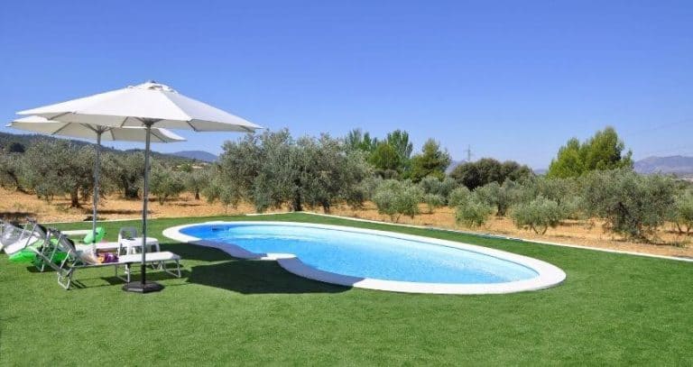 Cost of A concrete In-Ground pool: (With 40+ Real Examples)